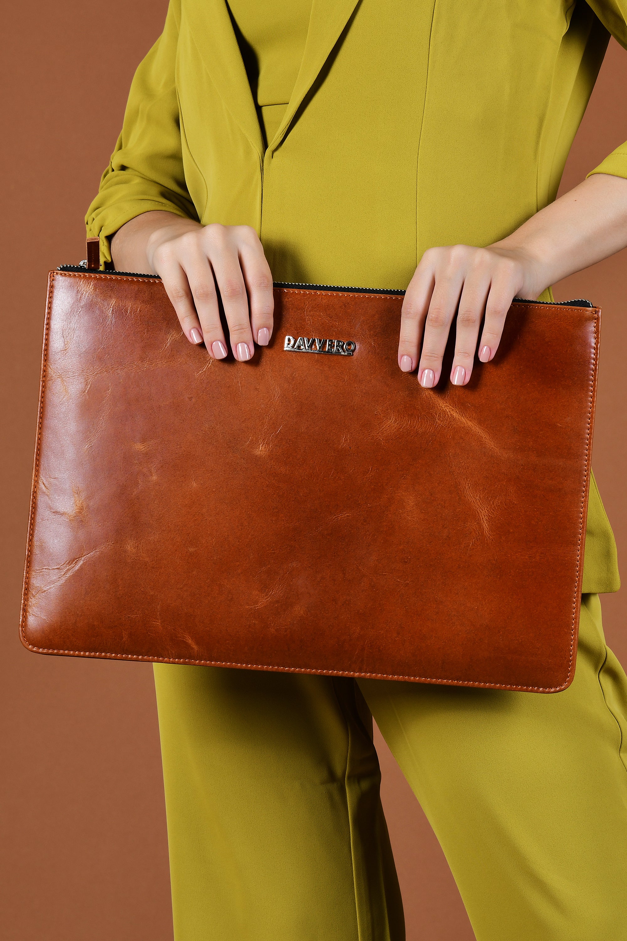 Model holding laptop sleeve
